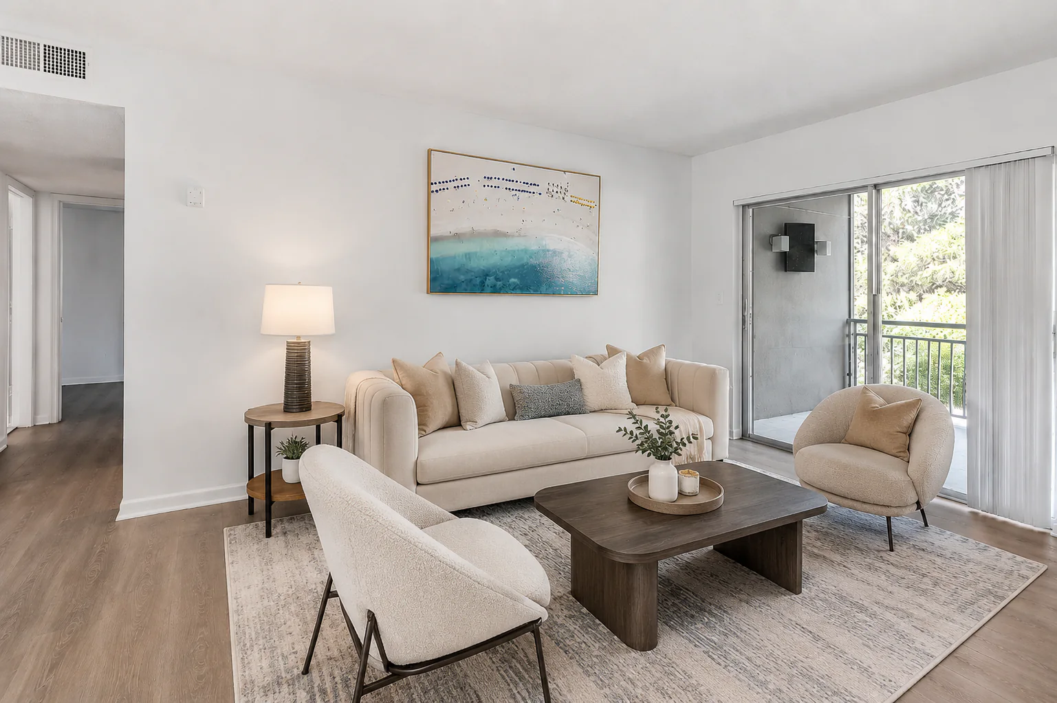 Welcoming Boca STR living room beside the screened balcony entrance